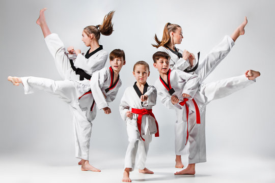 Children learning Taekwondo good for self-defense and confidence building

