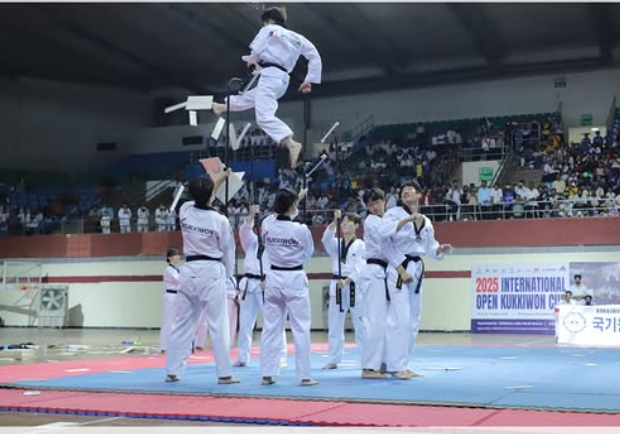 Group Taekwondo Demonstration performing  by  taekwondo athletes